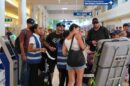 turistas internacionales aeropuerto de Cancún
